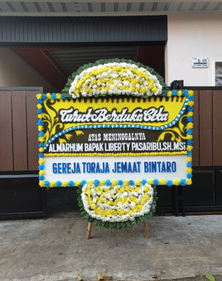Papan Bunga Duka di Dolok